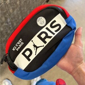 Jordan Paris Belt Bag in Black, Red, and Blue